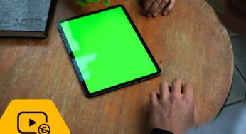 Woman and man with tablet and notebook